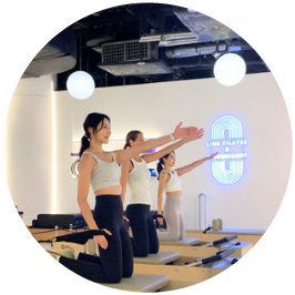 A Line Pilates reformer group class